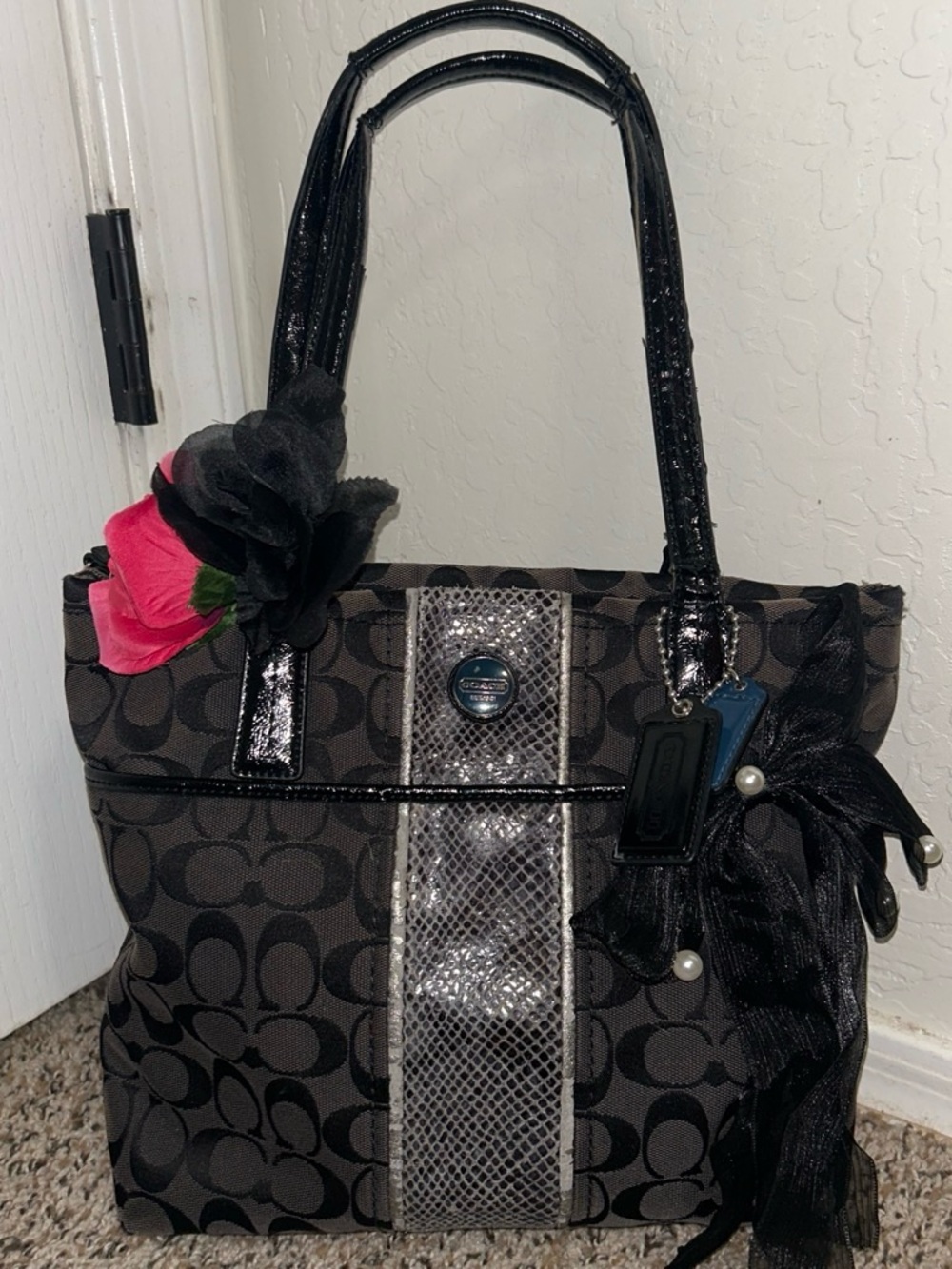Coach Black Signature Canvas Tote with Metallic Trim and Floral Accents